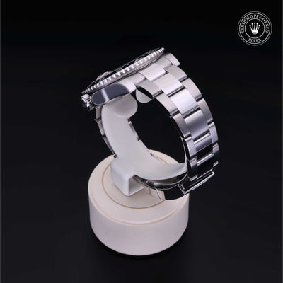 Rolex Certified Pre-owned GMT M116710LN-0001 front on black background