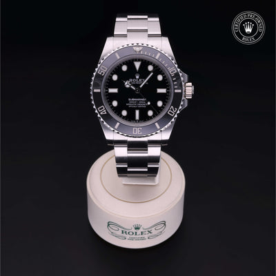 Rolex Certified Pre-owned Submariner M124060-0001 front on black background