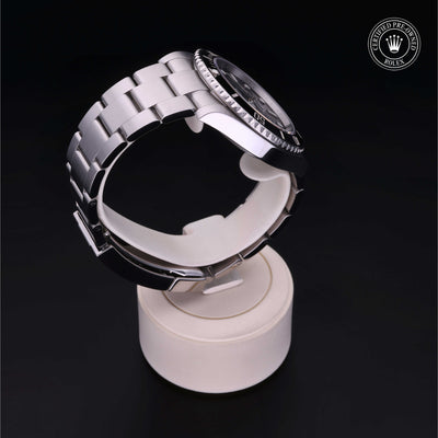 Rolex Certified Pre-owned Submariner M124060-0001 front on black background