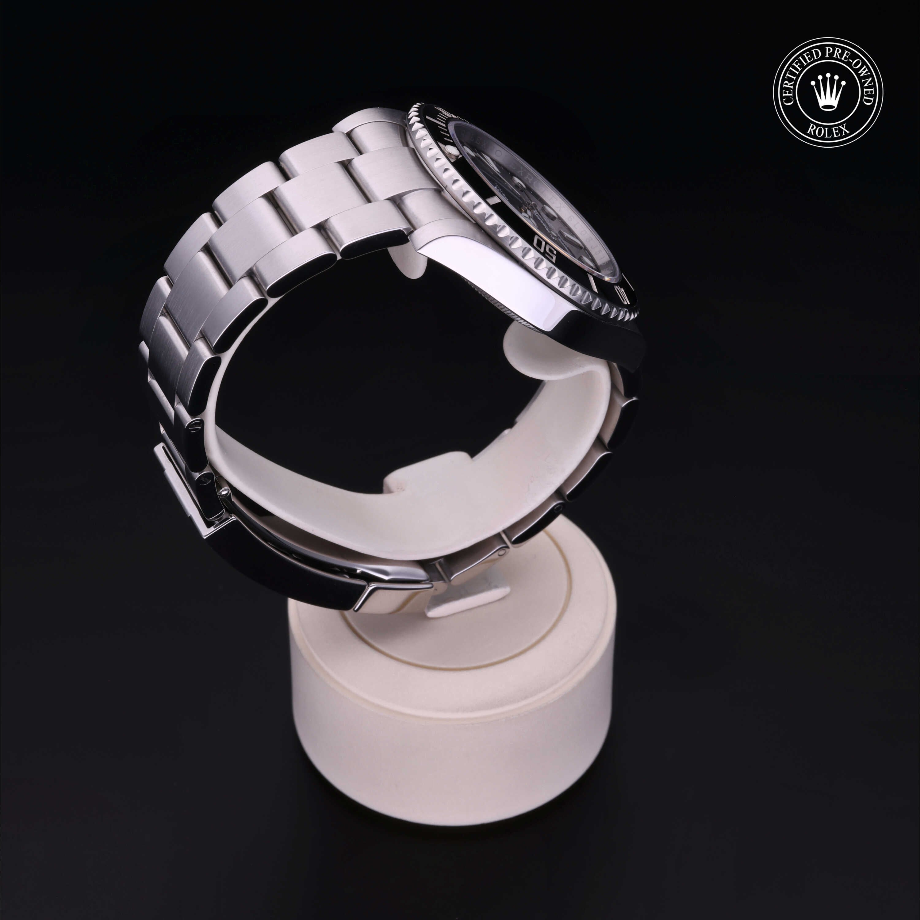 Rolex Certified Pre-owned Submariner M124060-0001 front on black background