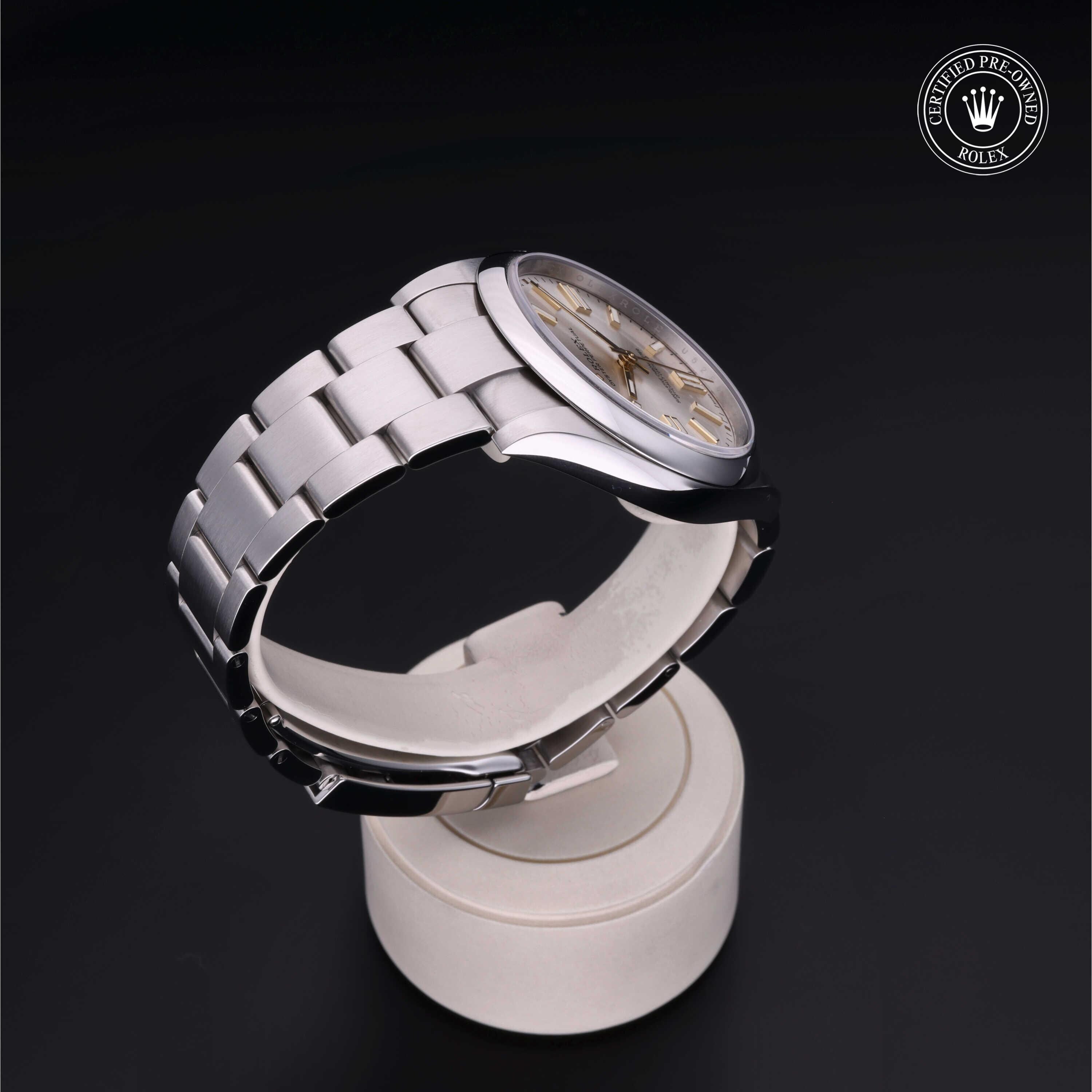 Rolex CPO Oyster Perpetual M124300 front on white background