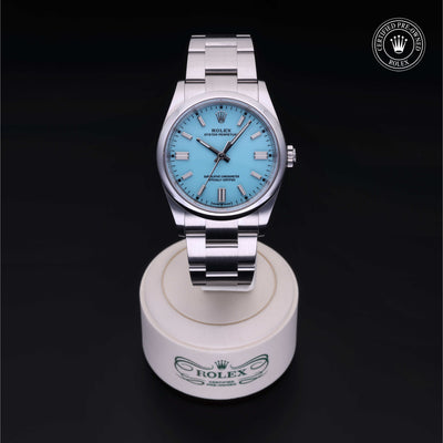 Rolex Certified Pre-owned Oyster Perpetual M126000-0006 front on black background