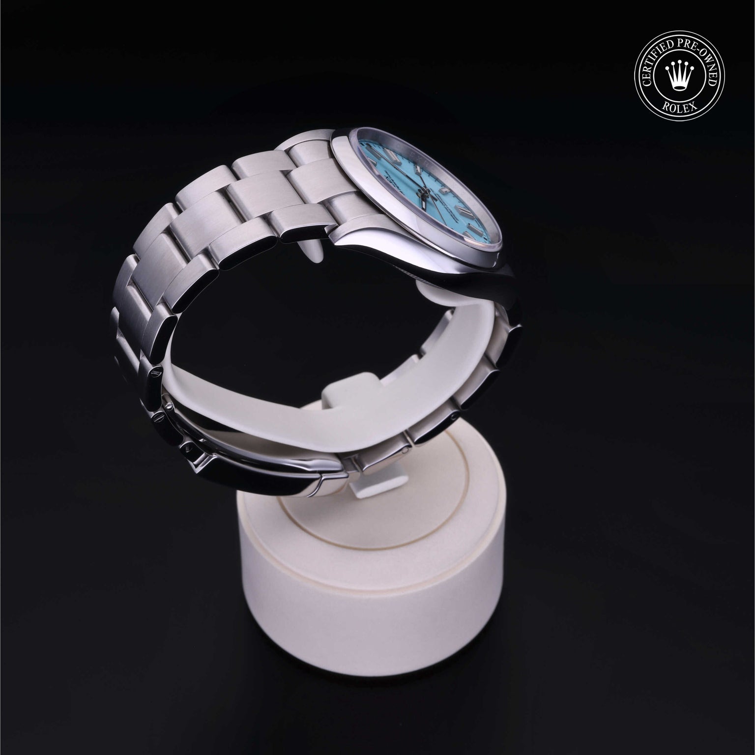 Rolex Certified Pre-owned Oyster Perpetual M126000-0006 front on black background