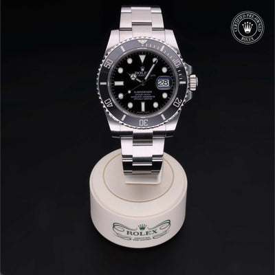 Rolex Certified Pre-owned Submariner M116610LN-0001 front on black background