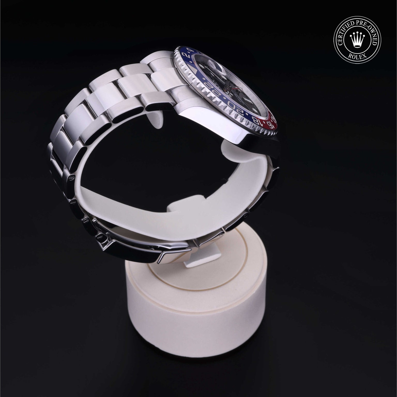 Rolex Certified Pre-owned GMT M126710BLRO-0002 front on black background