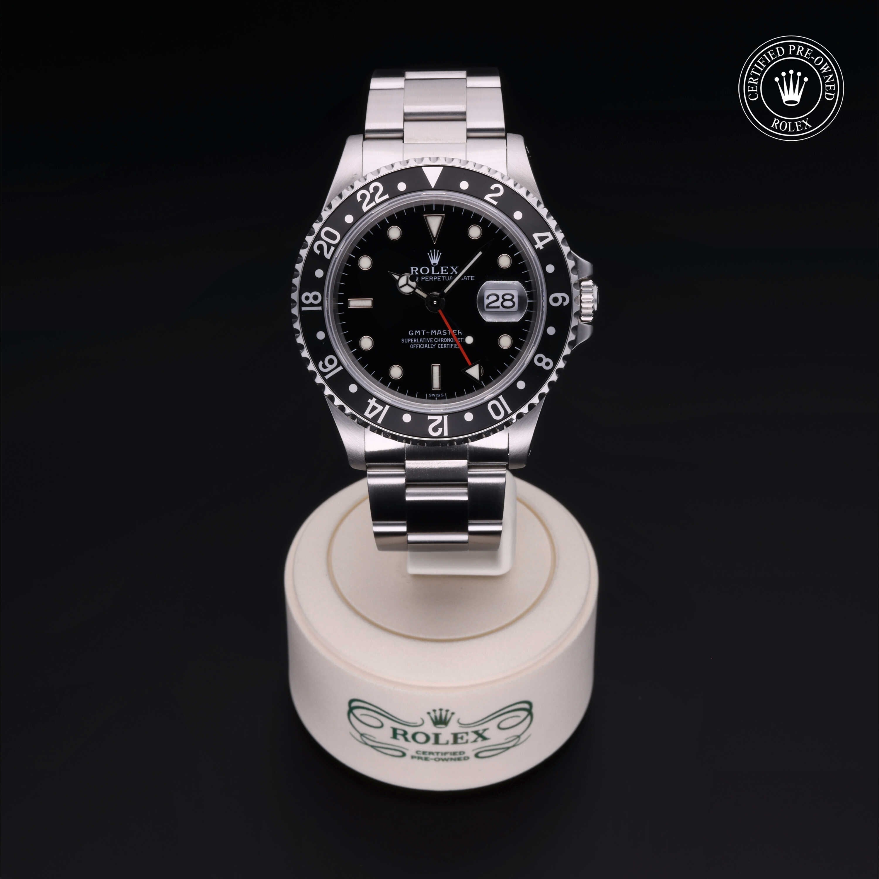 Rolex Certified Pre-owned GMT M16700LN-0001 front on black background