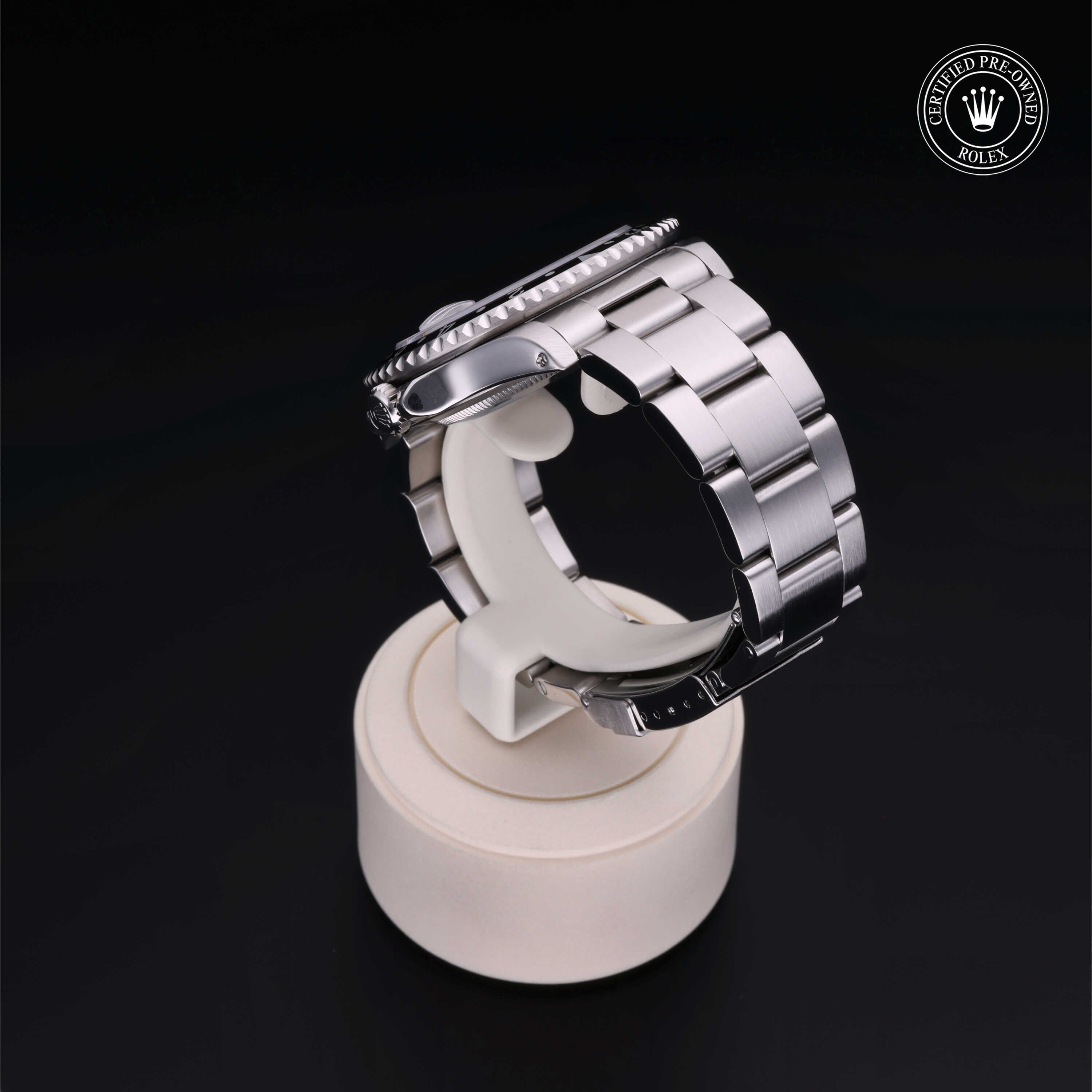 Rolex Certified Pre-owned GMT M16700LN-0001 front on black background