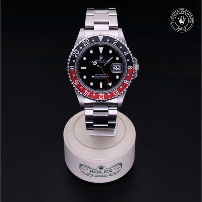 Rolex Certified Pre-owned GMT II M16710-0009 front on black background