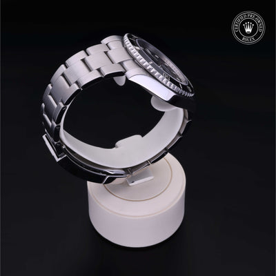 Rolex Certified Pre-owned Submariner M114060-0002 front on black background