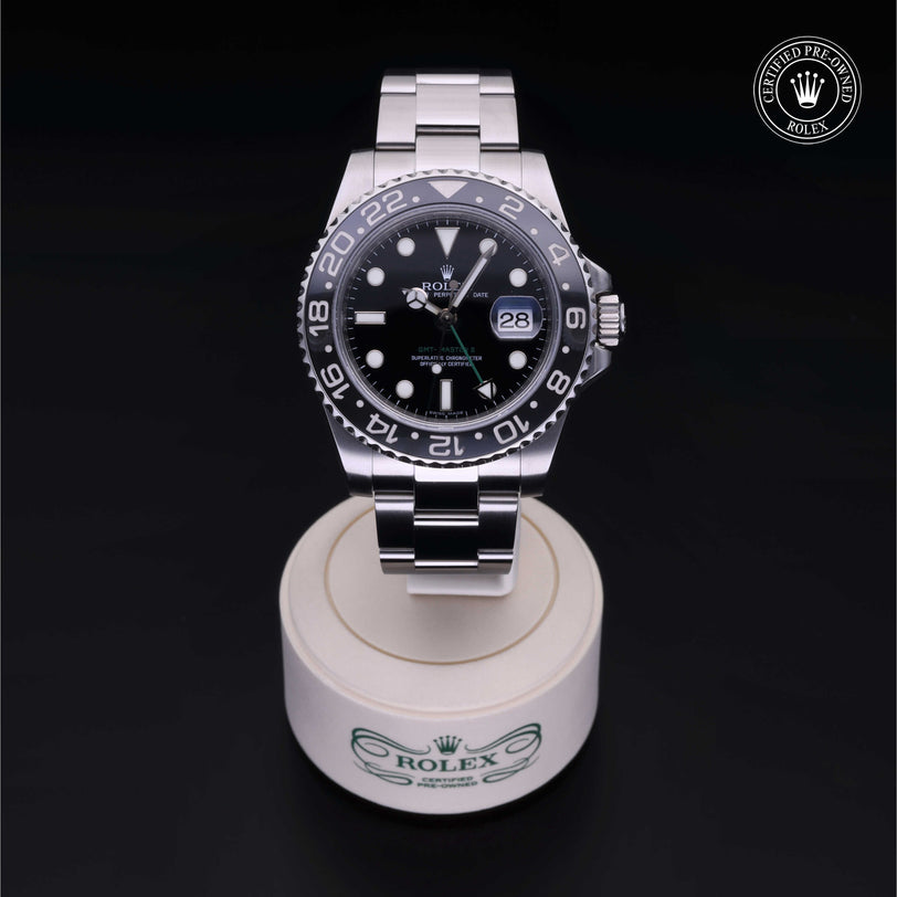 Rolex Certified Pre-owned GMT M116710LN-0001 front on black background