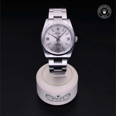Rolex Certified Pre-owned Oyster Perpetual M116000-0001 front on black background