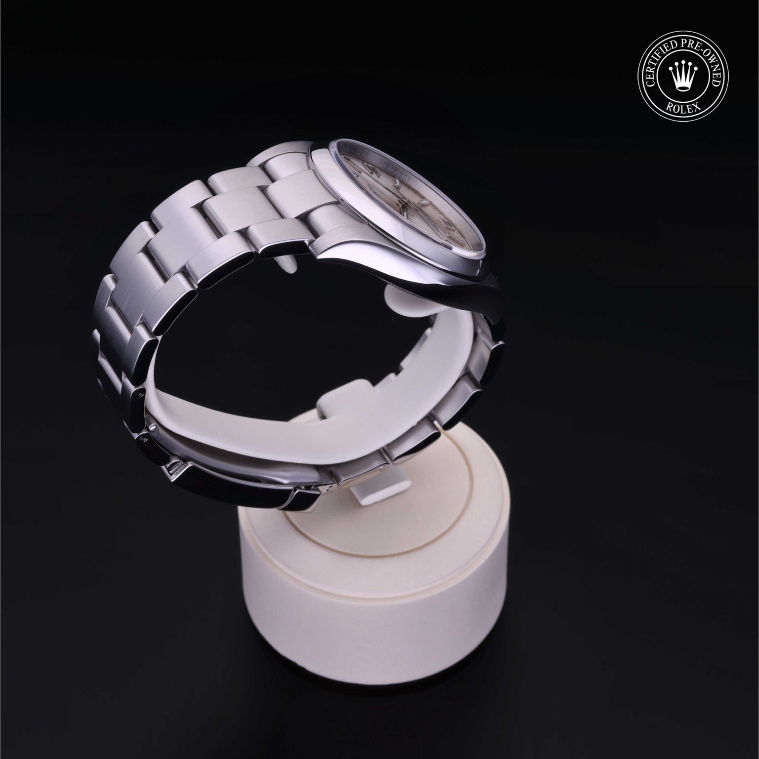Rolex Certified Pre-owned Oyster Perpetual M116000-0001 front on black background