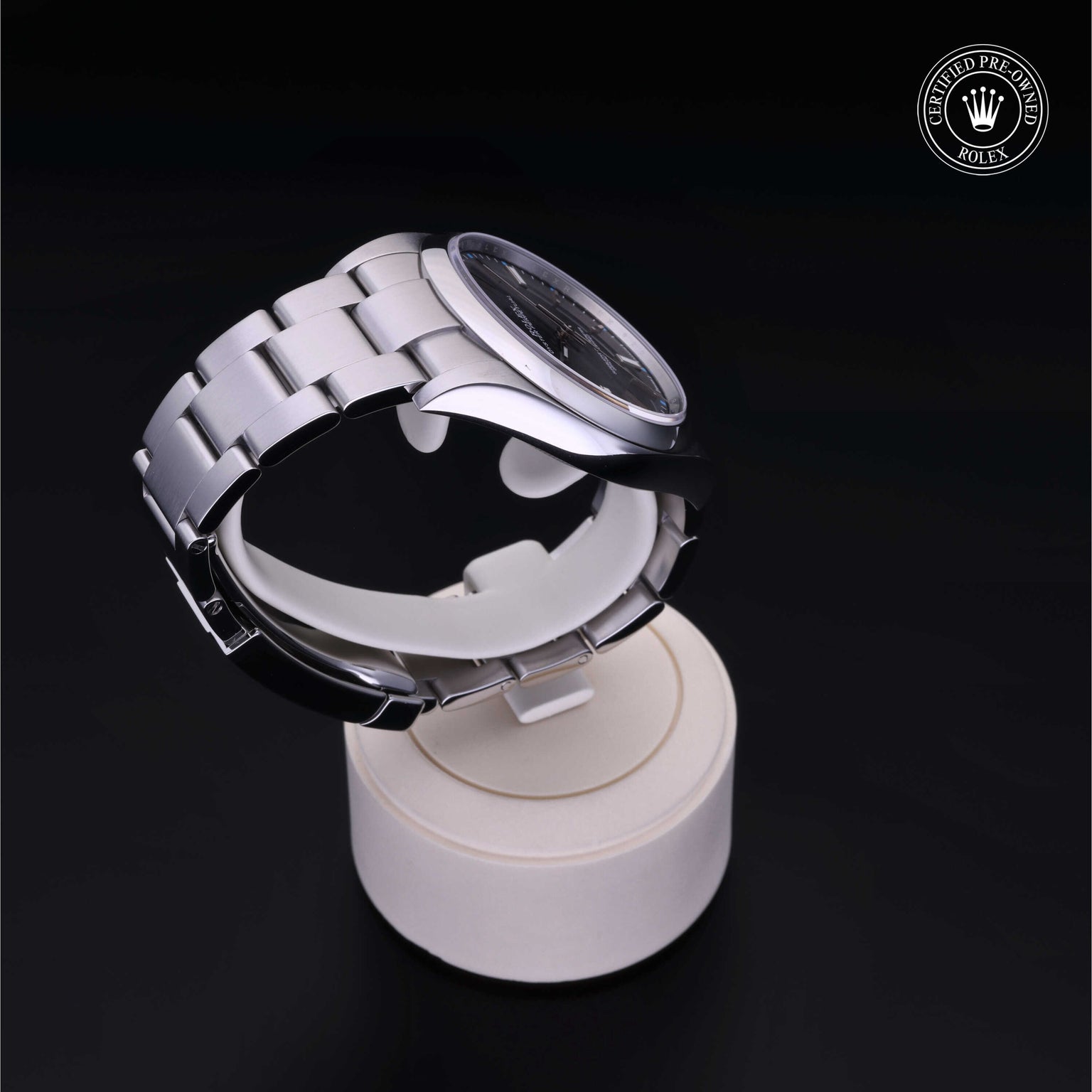 Rolex Certified Pre-owned Oyster Perpetual M114300-0001 front on black background