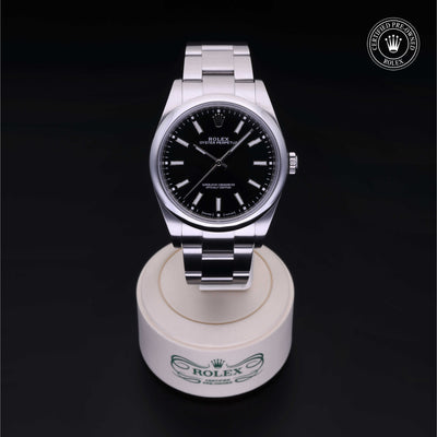 Rolex Certified Pre-owned Oyster Perpetual M114300-0001 front on black background
