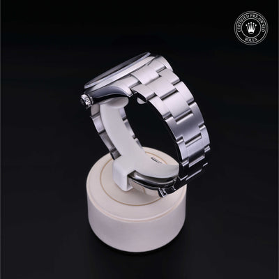 Rolex Certified Pre-owned Oyster Perpetual M114300-0001 front on black background