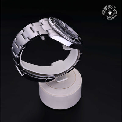 Rolex Certified Pre-owned Submariner M116610LN-0001 front on black background