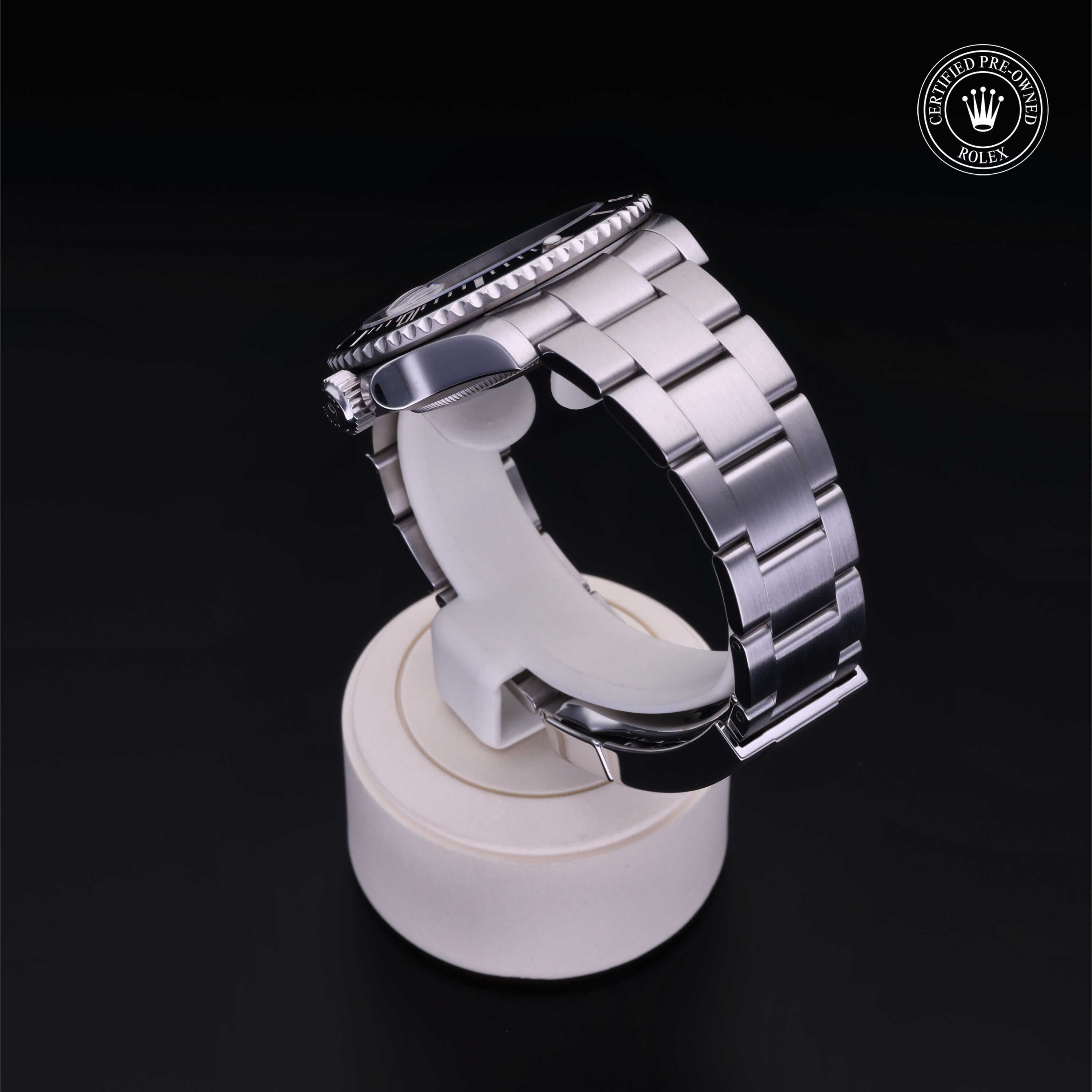 Rolex Certified Pre-owned Submariner M126610LN-0001 front on black background