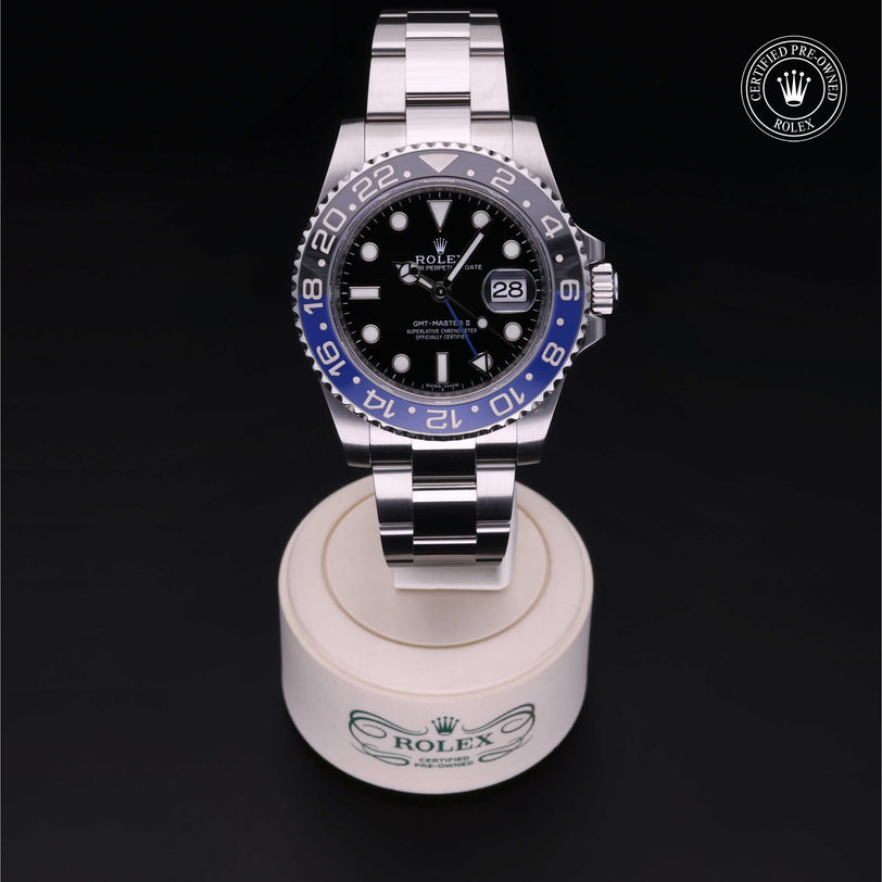 Rolex Certified Pre-owned GMT M116710BLNR-0002 front on black background
