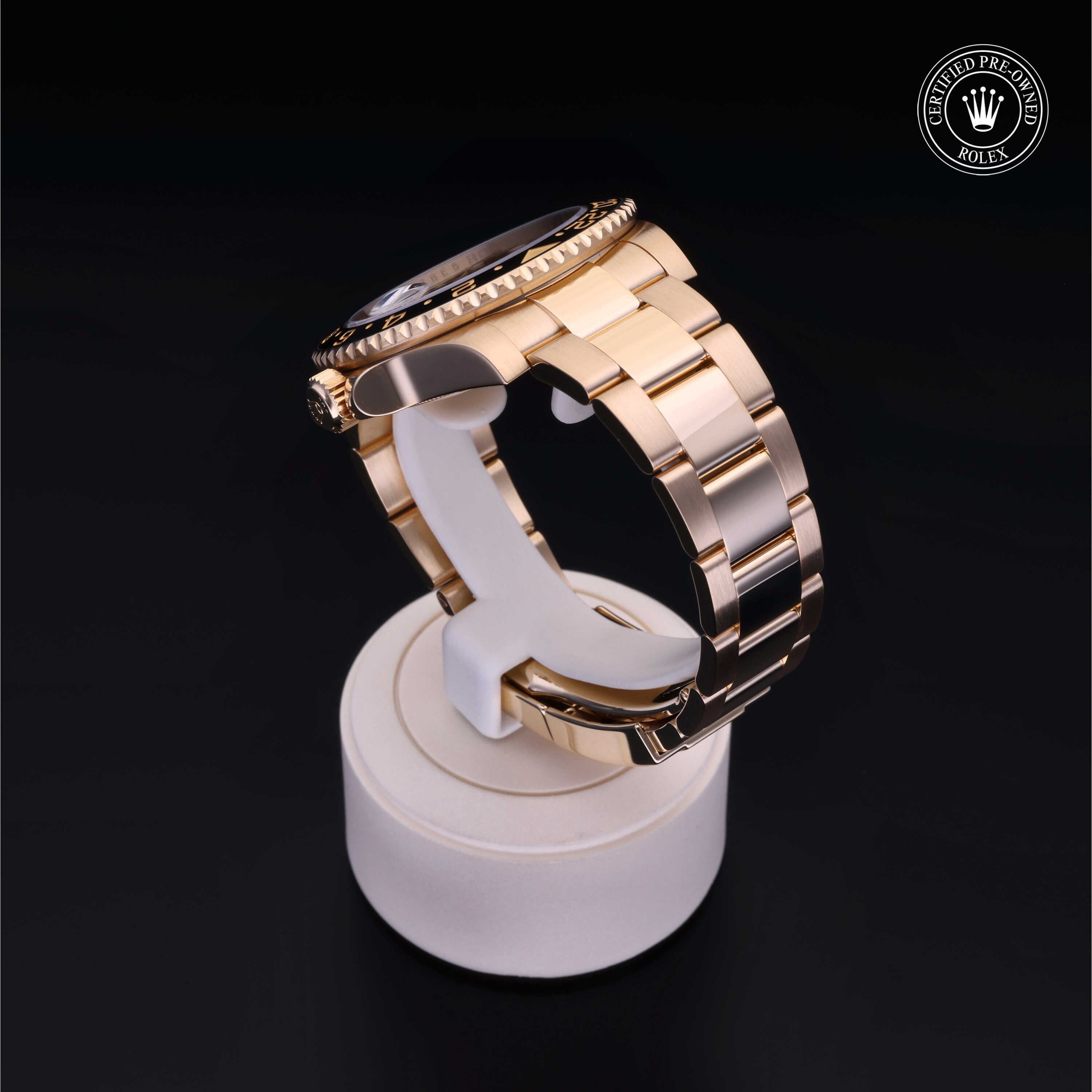 Rolex Certified Pre-owned GMT M116718LN-0001 front on black background