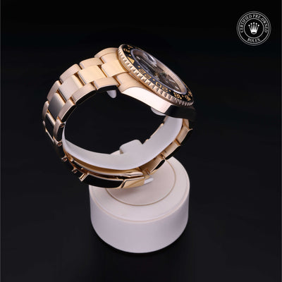 Rolex Certified Pre-owned GMT M116718LN-0001 front on black background