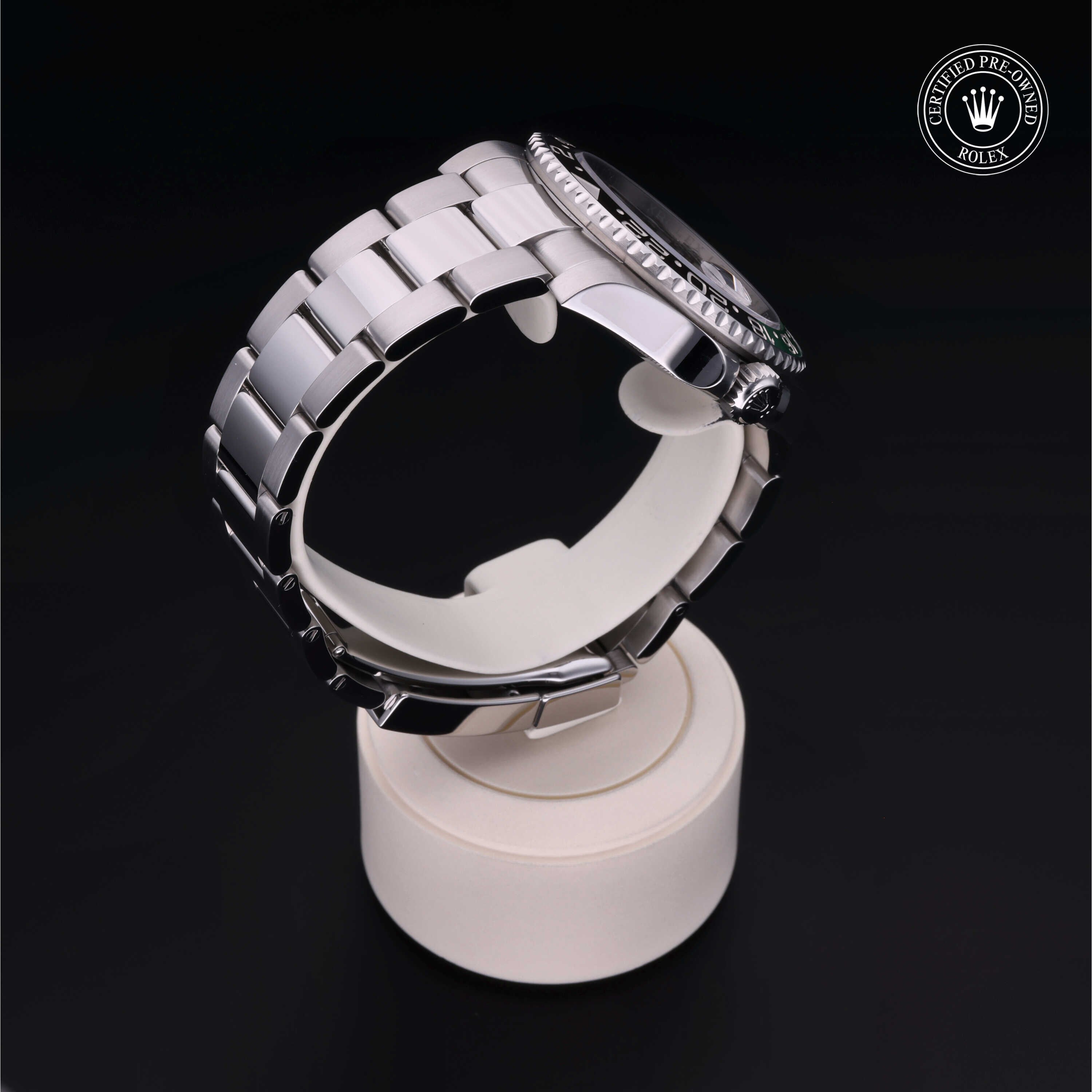 Rolex Certified Pre-owned GMT M126720VTNR-0001 front on black background