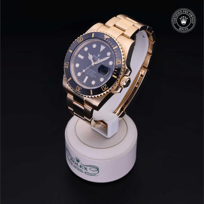 Rolex Certified Pre-owned Submariner M116618LN-0001 front on black background