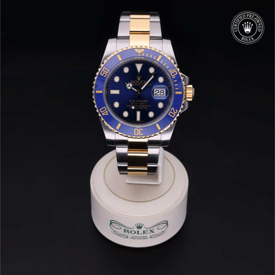 Rolex Certified Pre-owned Submariner M116613LB-0005 front on black background