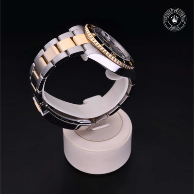 Rolex Certified Pre-owned Submariner M116613LN-0001 front on black background