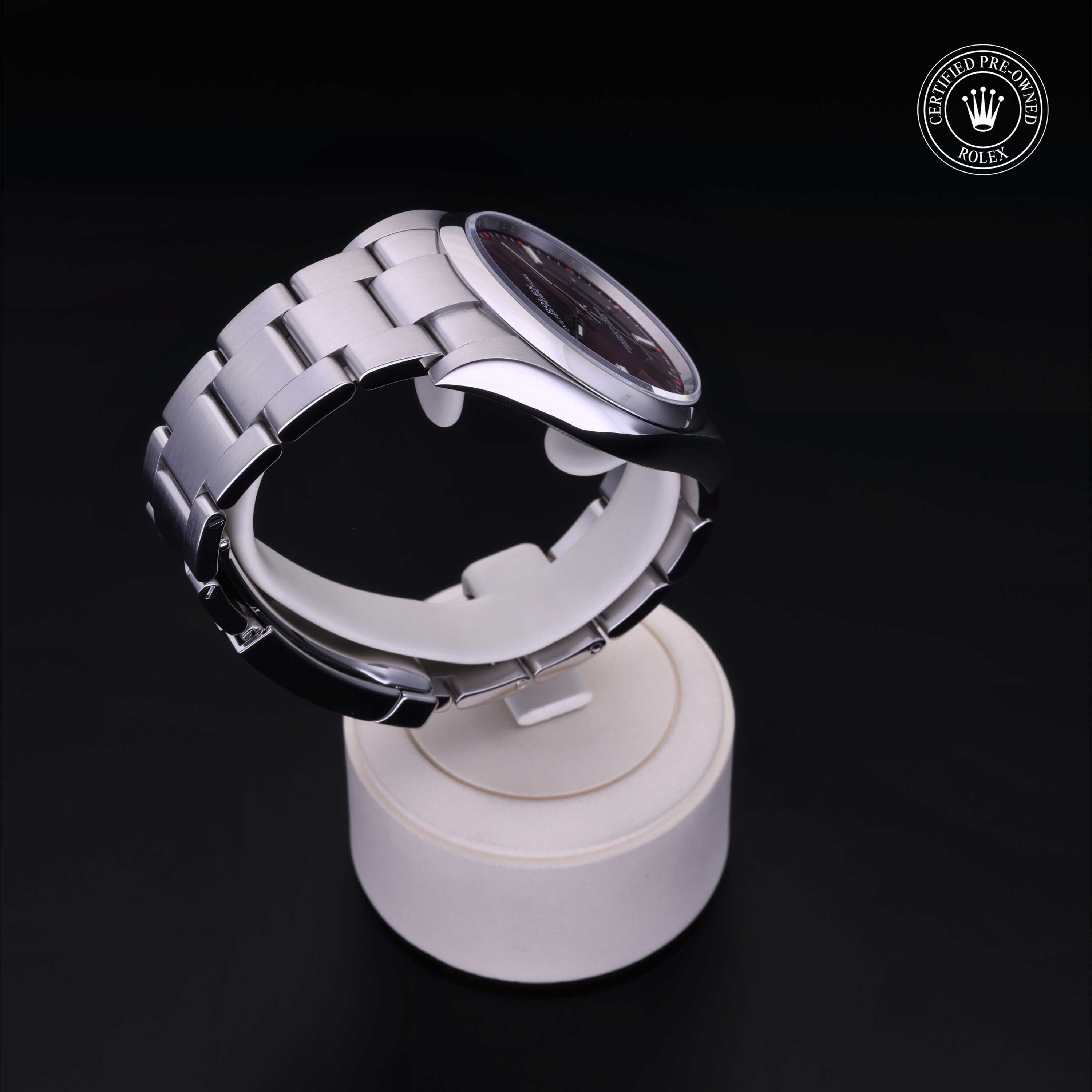 Rolex Certified Pre-owned Oyster Perpetual M114300-0002 front on black background