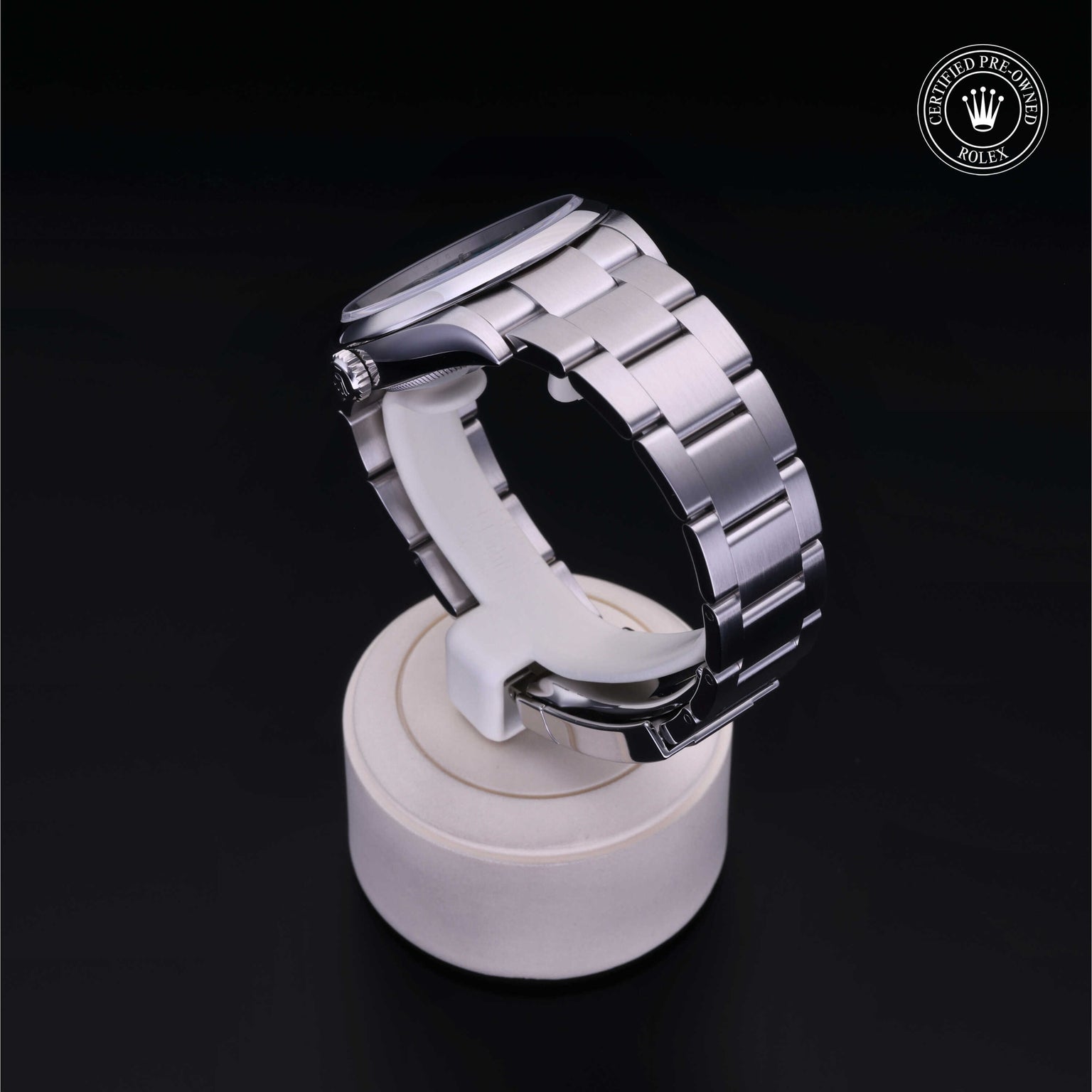 Rolex Certified Pre-owned Oyster Perpetual M126000-0006 front on black background