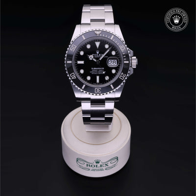 Rolex Certified Pre-owned Submariner M126610LN-0001 front on black background
