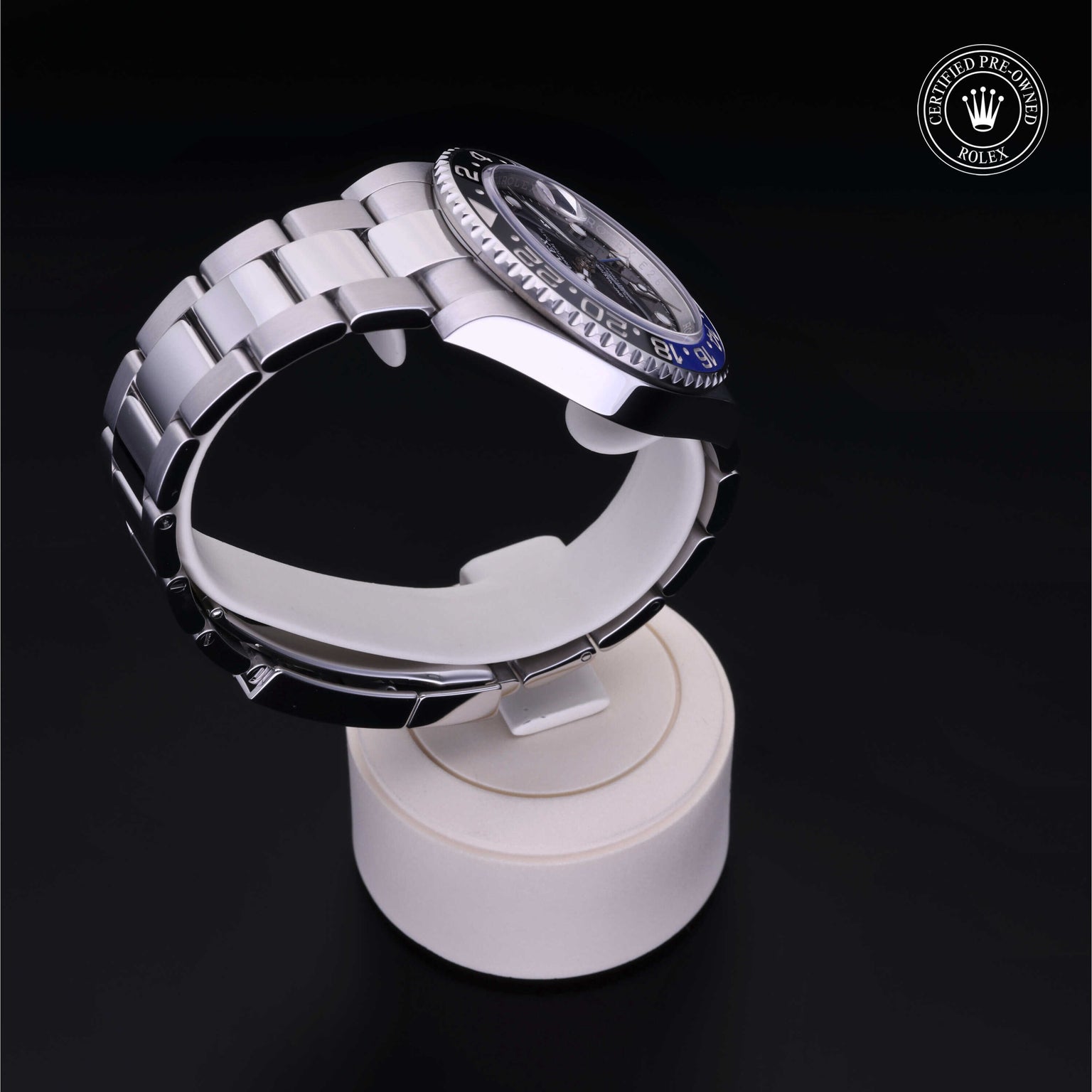 Rolex Certified Pre-owned GMT M126710BLNR-0003 front on black background