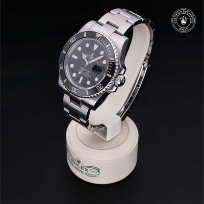 Rolex Certified Pre-owned Submariner M116610LN-0001 front on black background