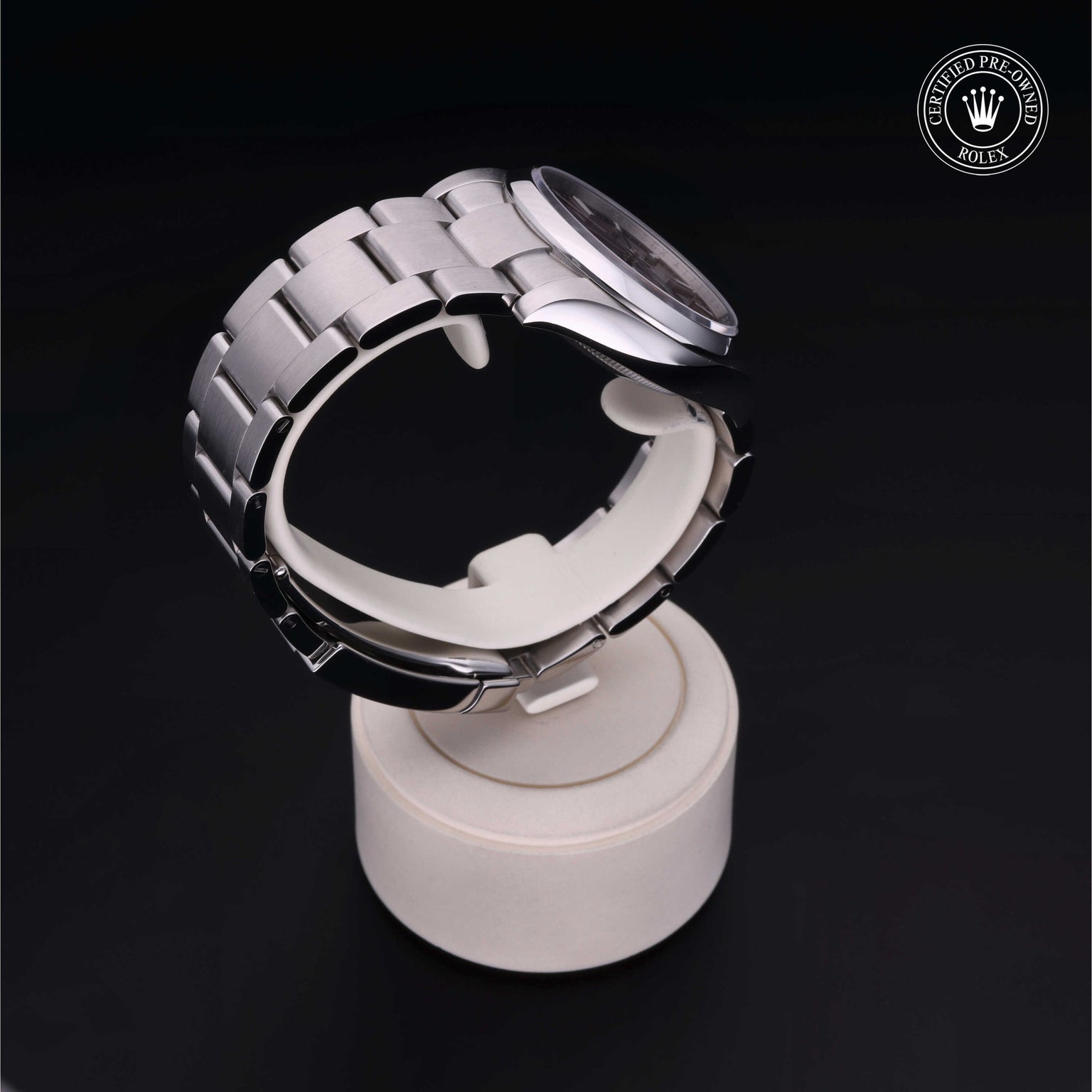 Rolex Certified Pre-owned Oyster Perpetual M114200-0020 front on black background