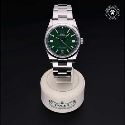 Rolex Certified Pre-owned Oyster Perpetual M126000-0005 front on black background