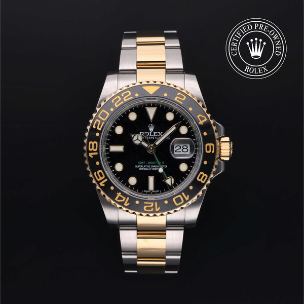 Rolex Certified Pre-owned GMT M116713LN-0001 front on black background