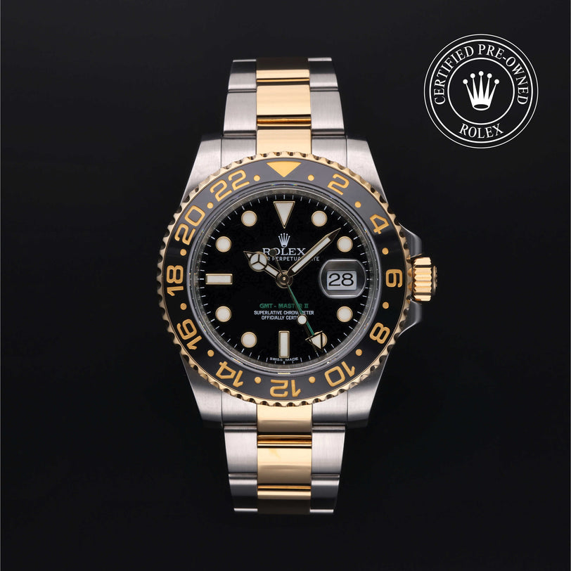 Rolex Certified Pre-owned GMT M116713LN-0001 front on black background