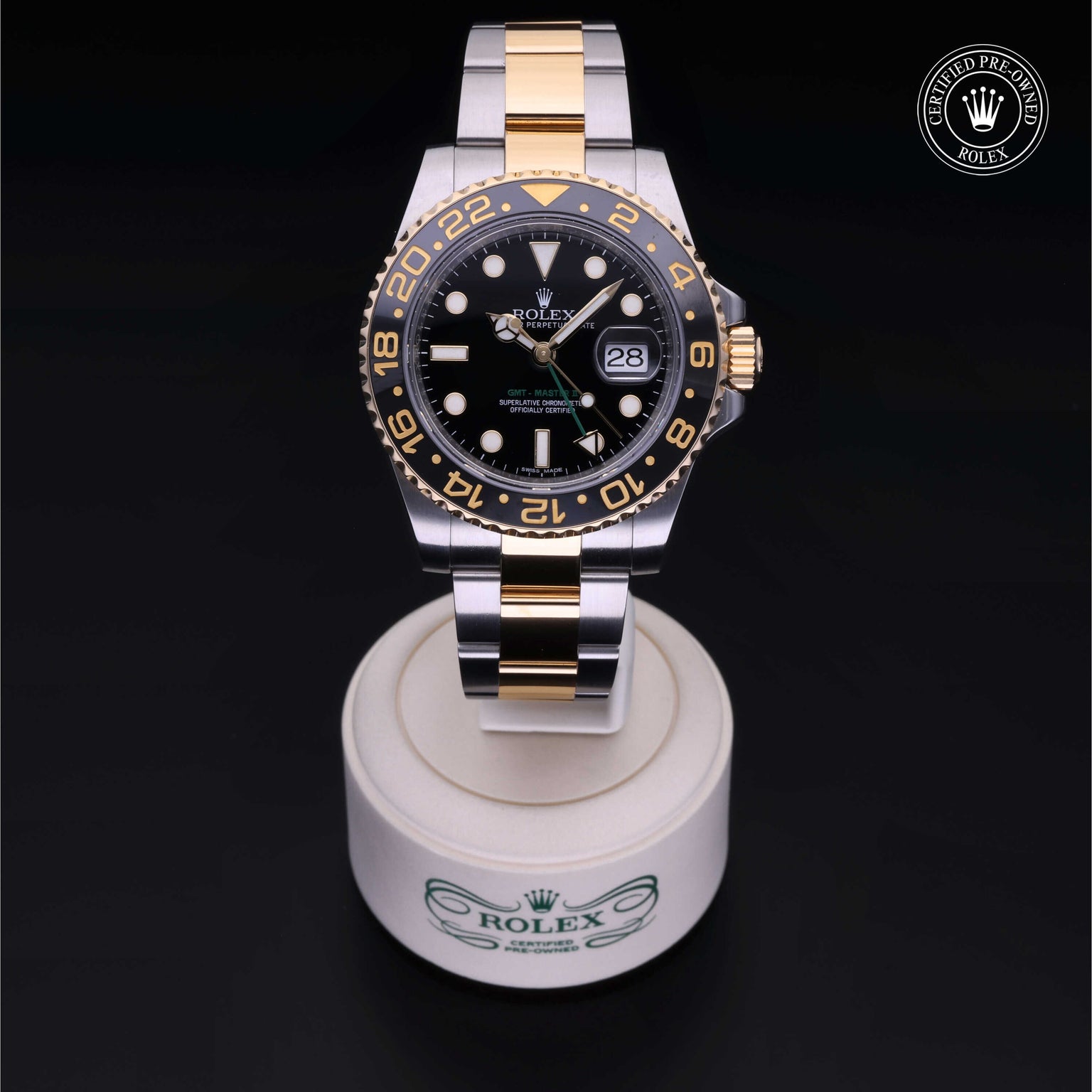 Rolex Certified Pre-owned GMT M116713LN-0001 front on black background
