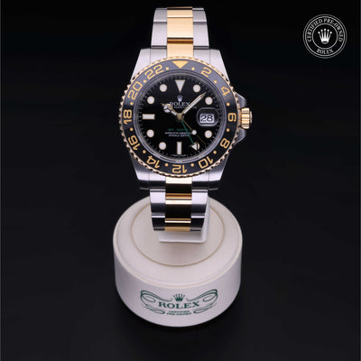 Rolex Certified Pre-owned GMT M116713LN-0001 front on black background