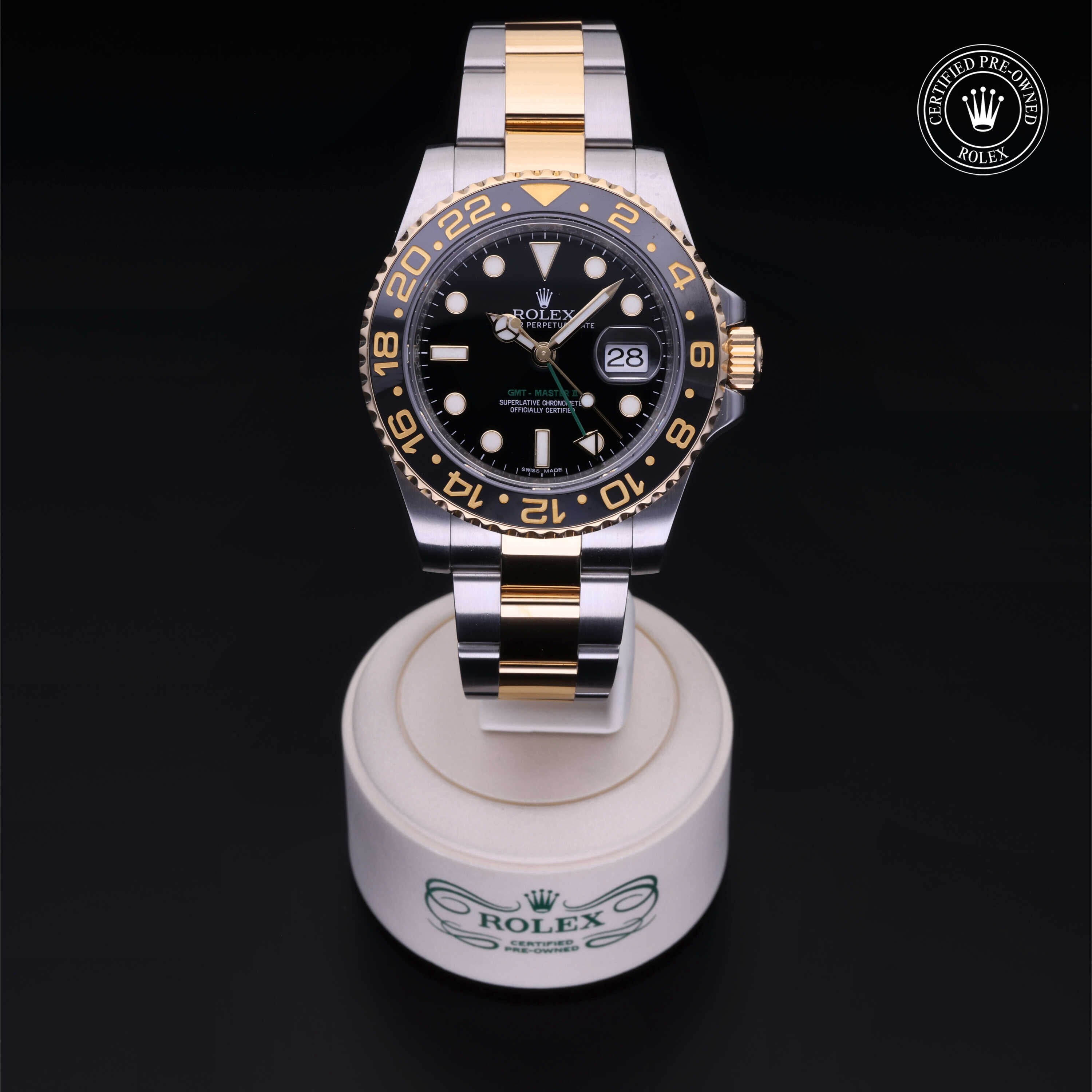 Rolex Certified Pre-owned GMT M116713LN-0001 front on black background