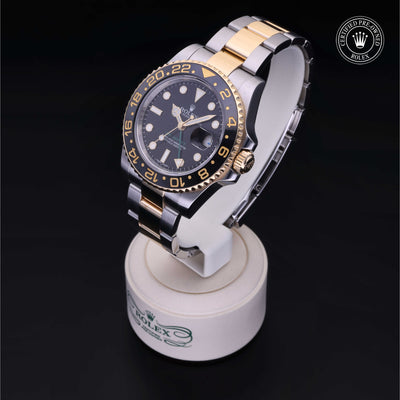 Rolex Certified Pre-owned GMT M116713LN-0001 front on black background