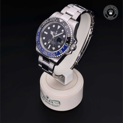 Rolex Certified Pre-owned GMT M116710BLNR-0002 front on black background