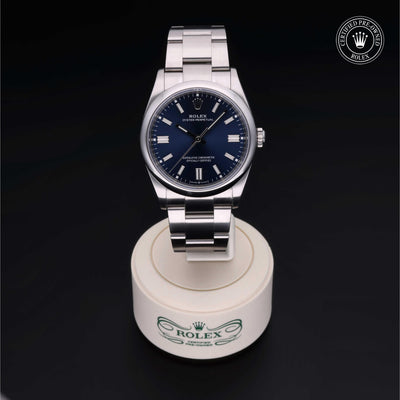 Rolex CPO Oyster Perpetual M126000 front on white background