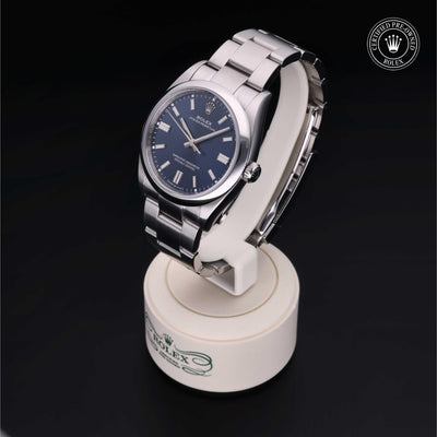 Rolex CPO Oyster Perpetual M126000 front on white background