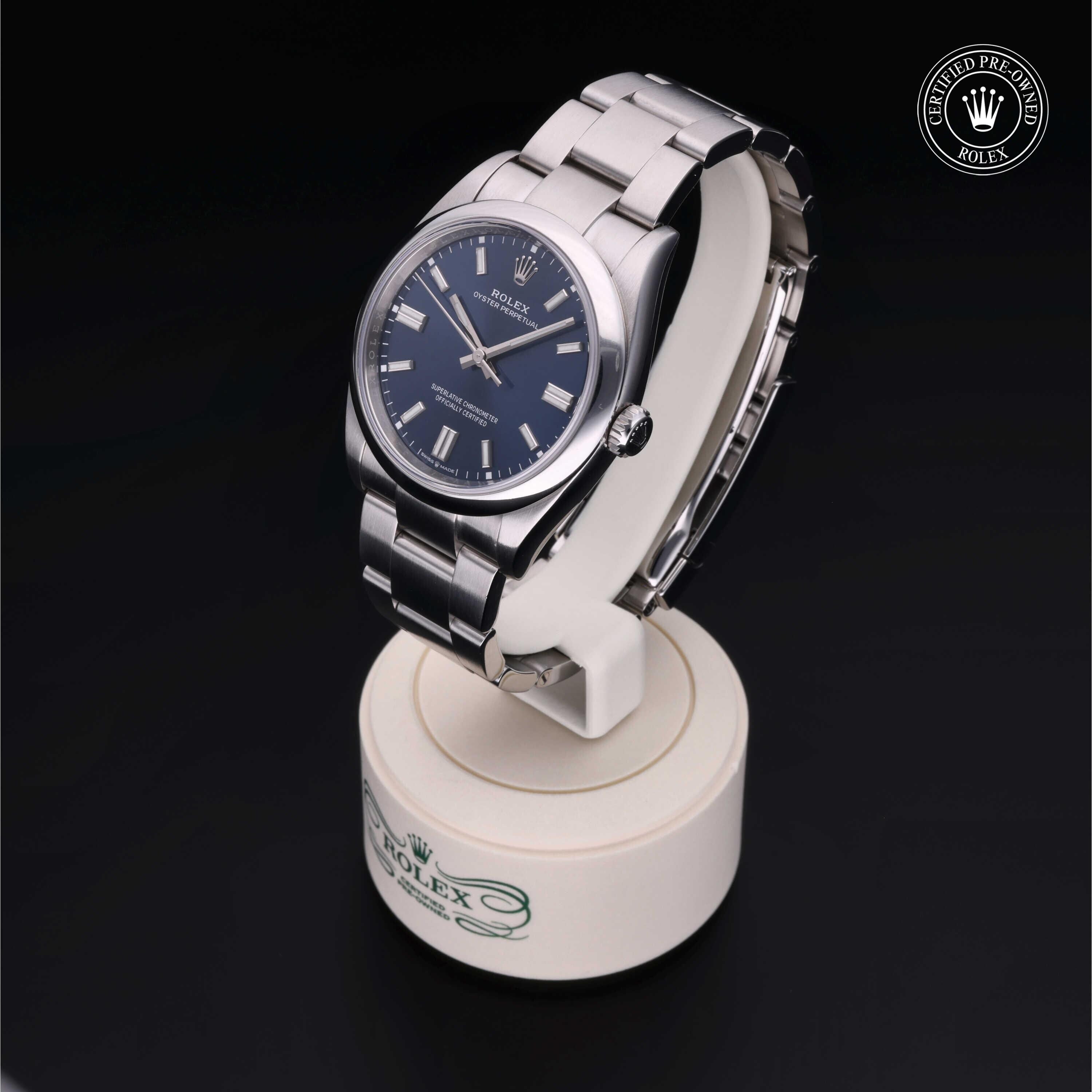 Rolex CPO Oyster Perpetual M126000 front on white background