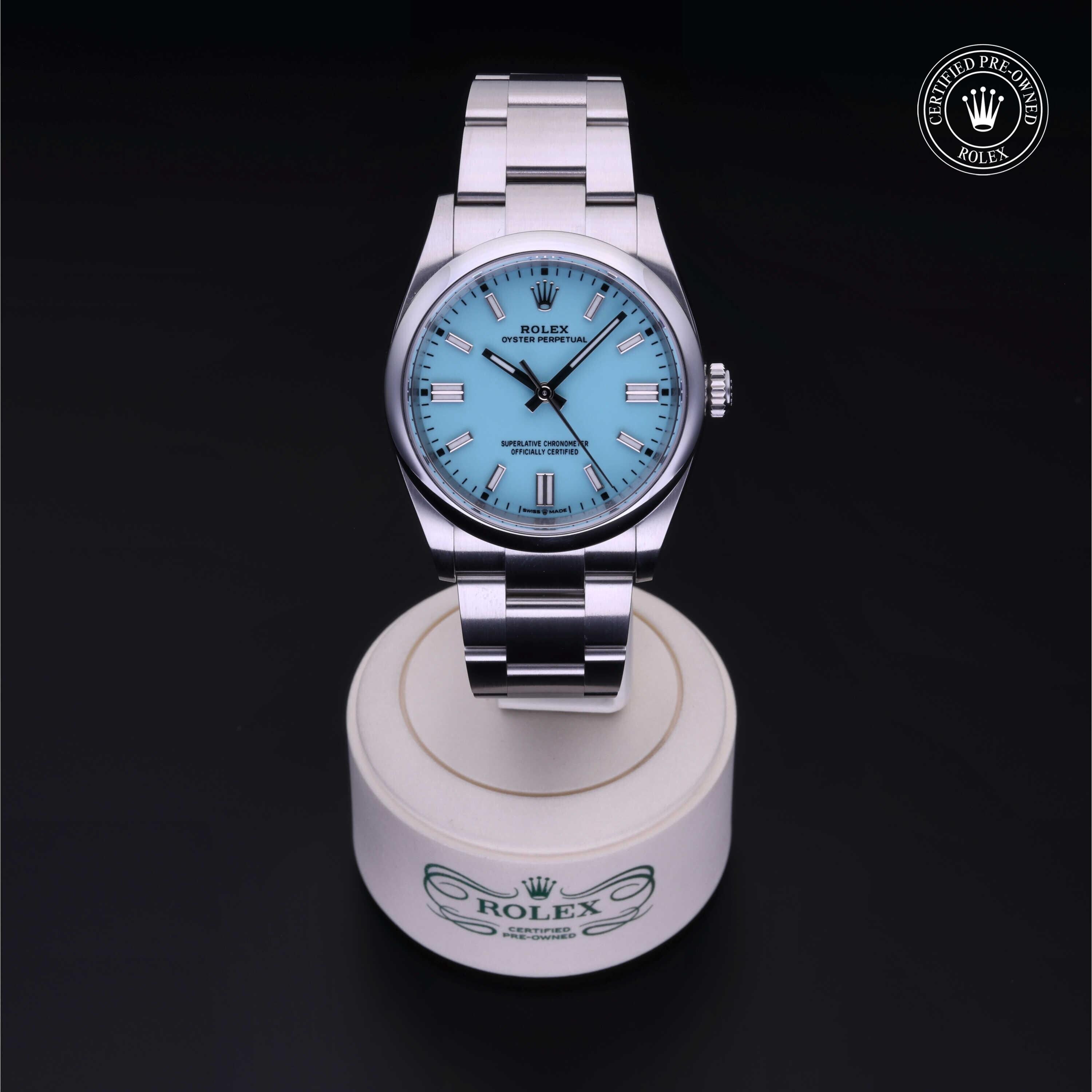 Rolex CPO Oyster Perpetual M126000 front on white background