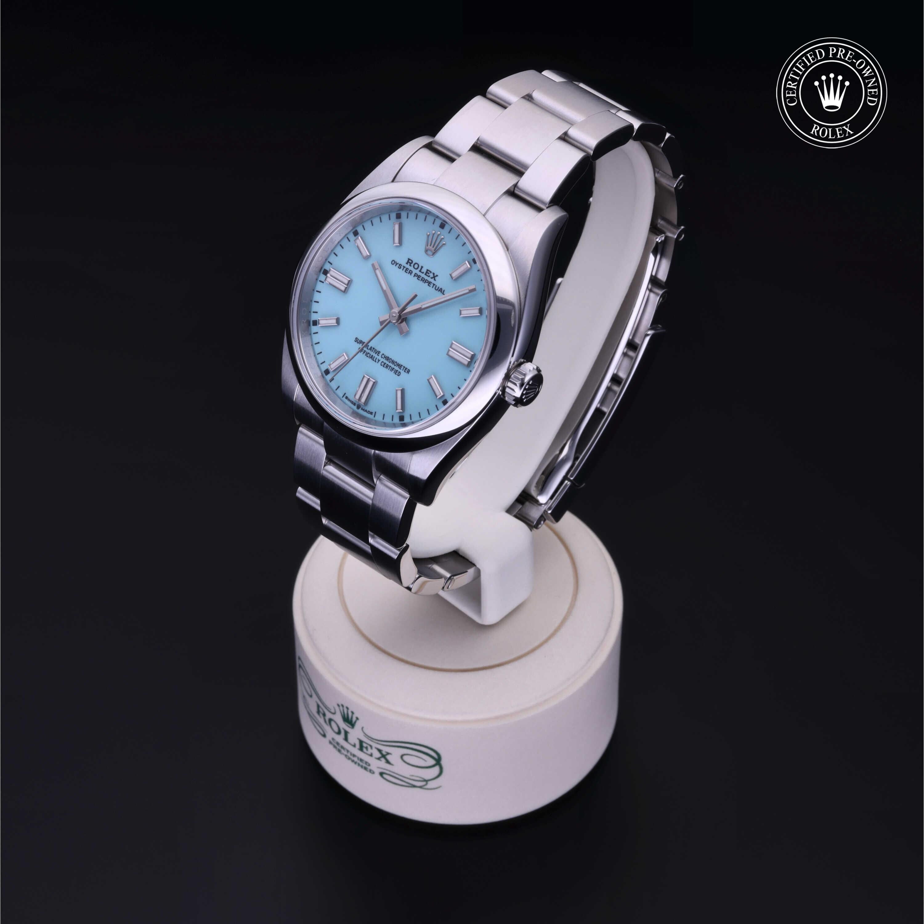 Rolex CPO Oyster Perpetual M126000 front on white background