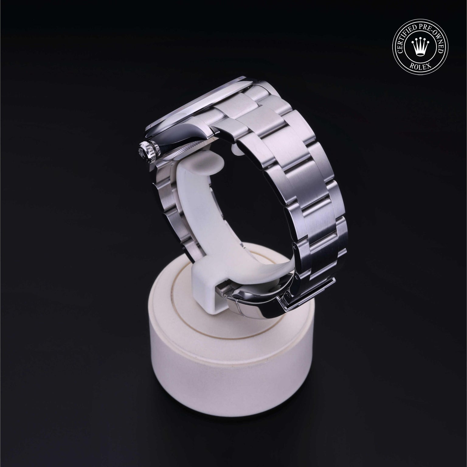 Rolex CPO Oyster Perpetual M126000 front on white background