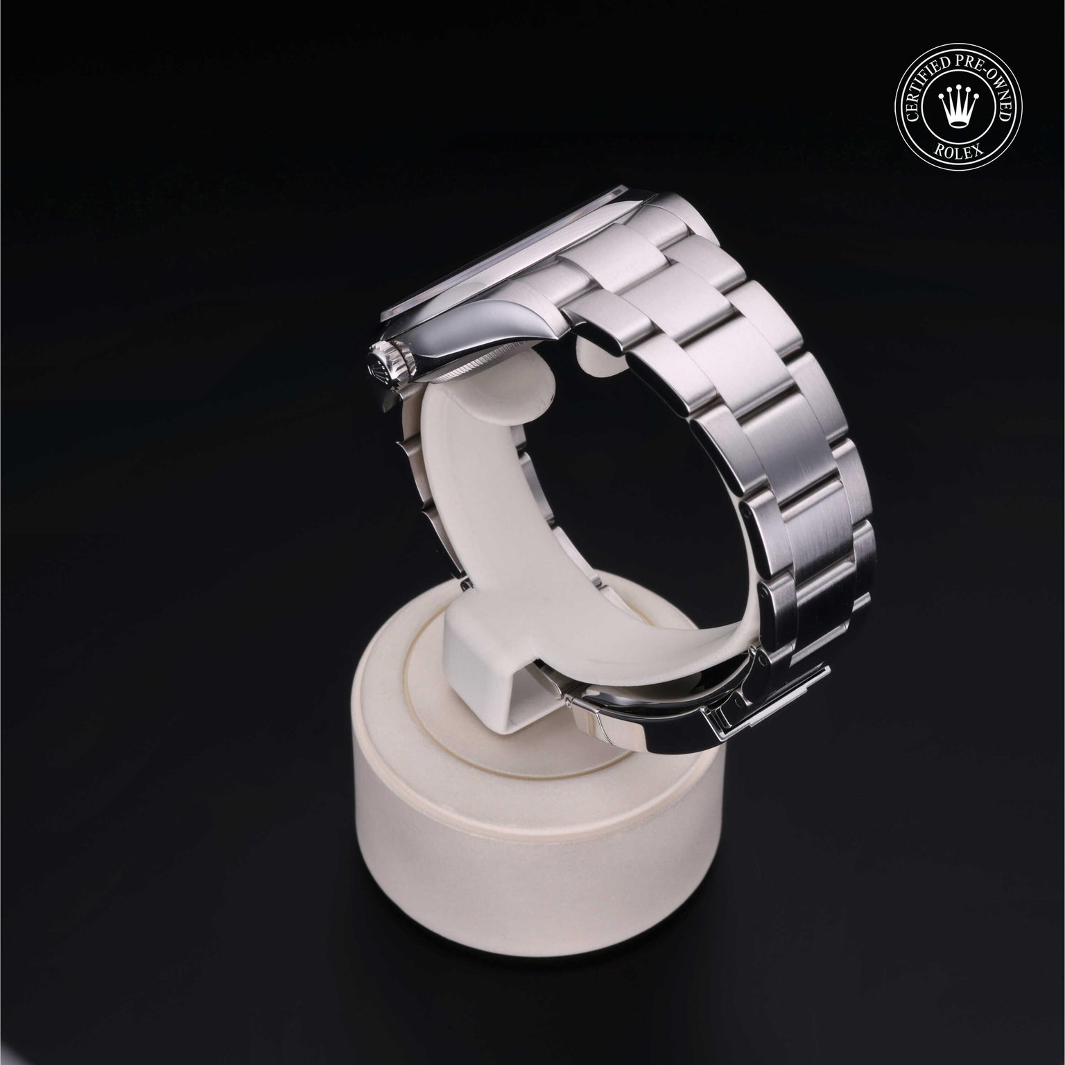 Rolex Certified Pre-owned Oyster Perpetual M114300-0005 front on black background