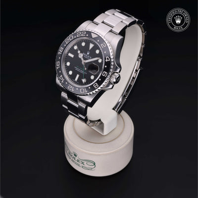 Rolex Certified Pre-owned GMT M116710LN-0001 front on black background